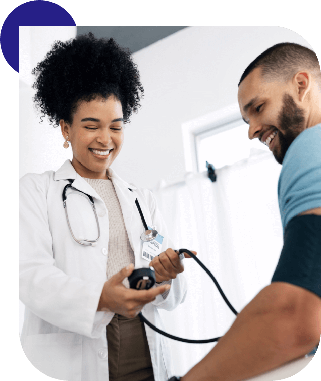 Doctor taking patient's blood pressure.