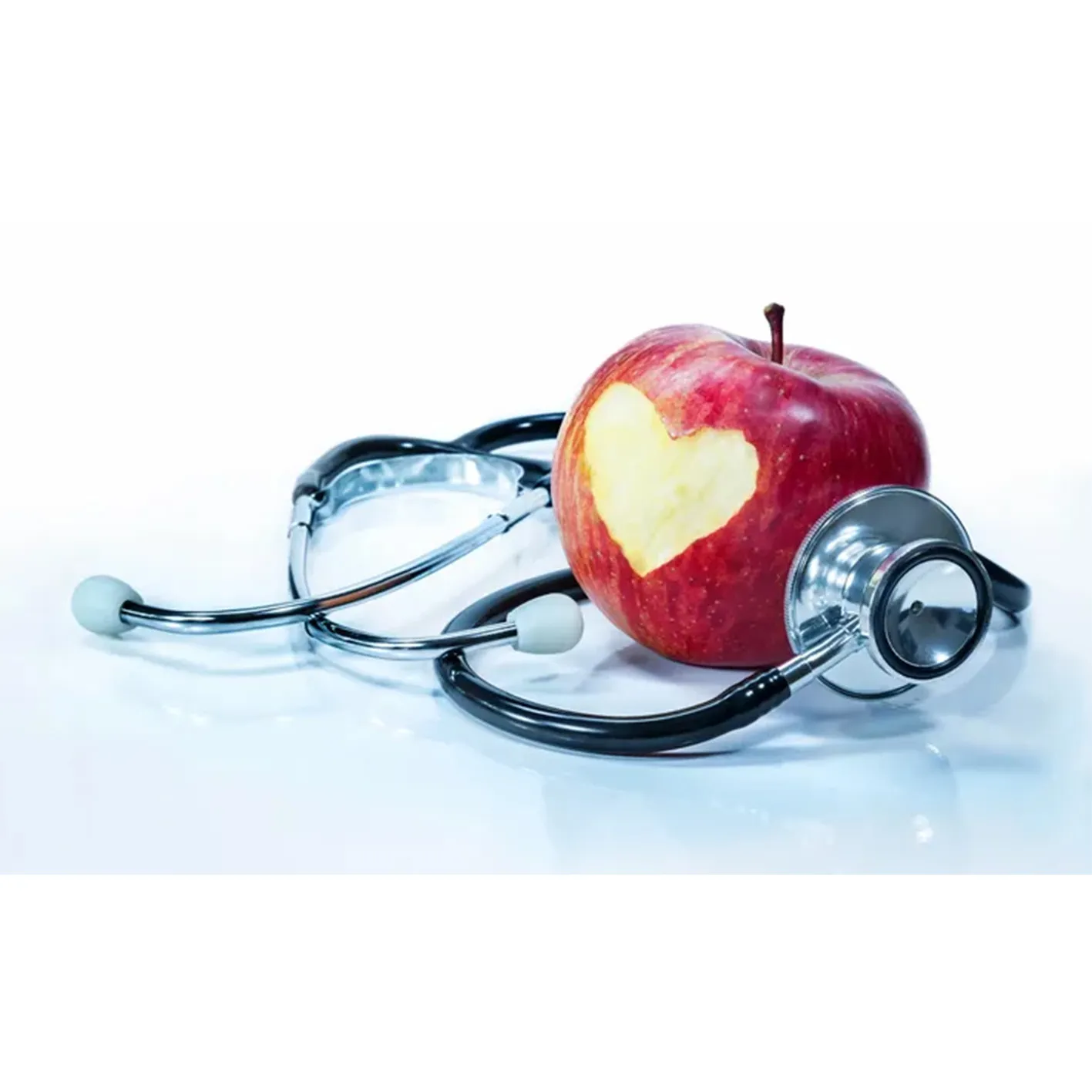 Here's an alt tag for the image: Apple with heart, stethoscope, healthy heart.